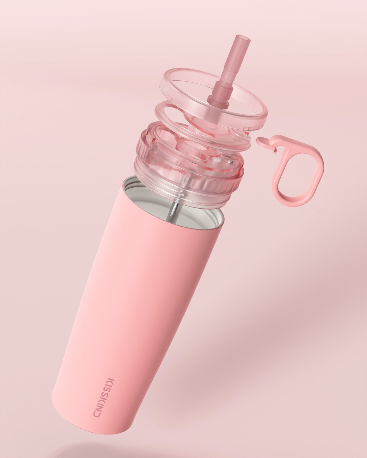 Lid, cleaning cap and straw lifted apart above the cup
