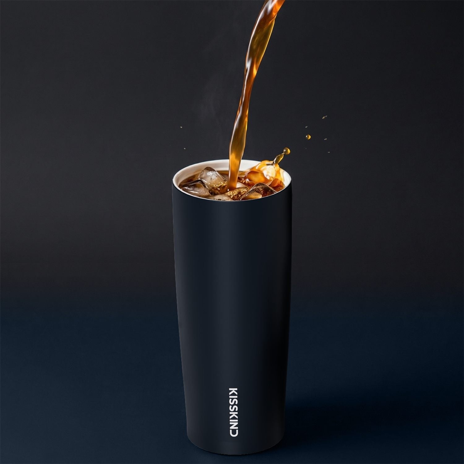 Cold brew poured into a KissKind iced coffee tumbler.