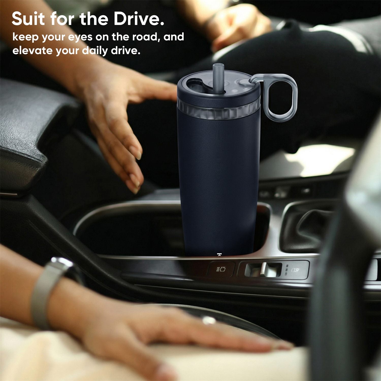 KissKind travel iced coffee cup in a car cup holder.