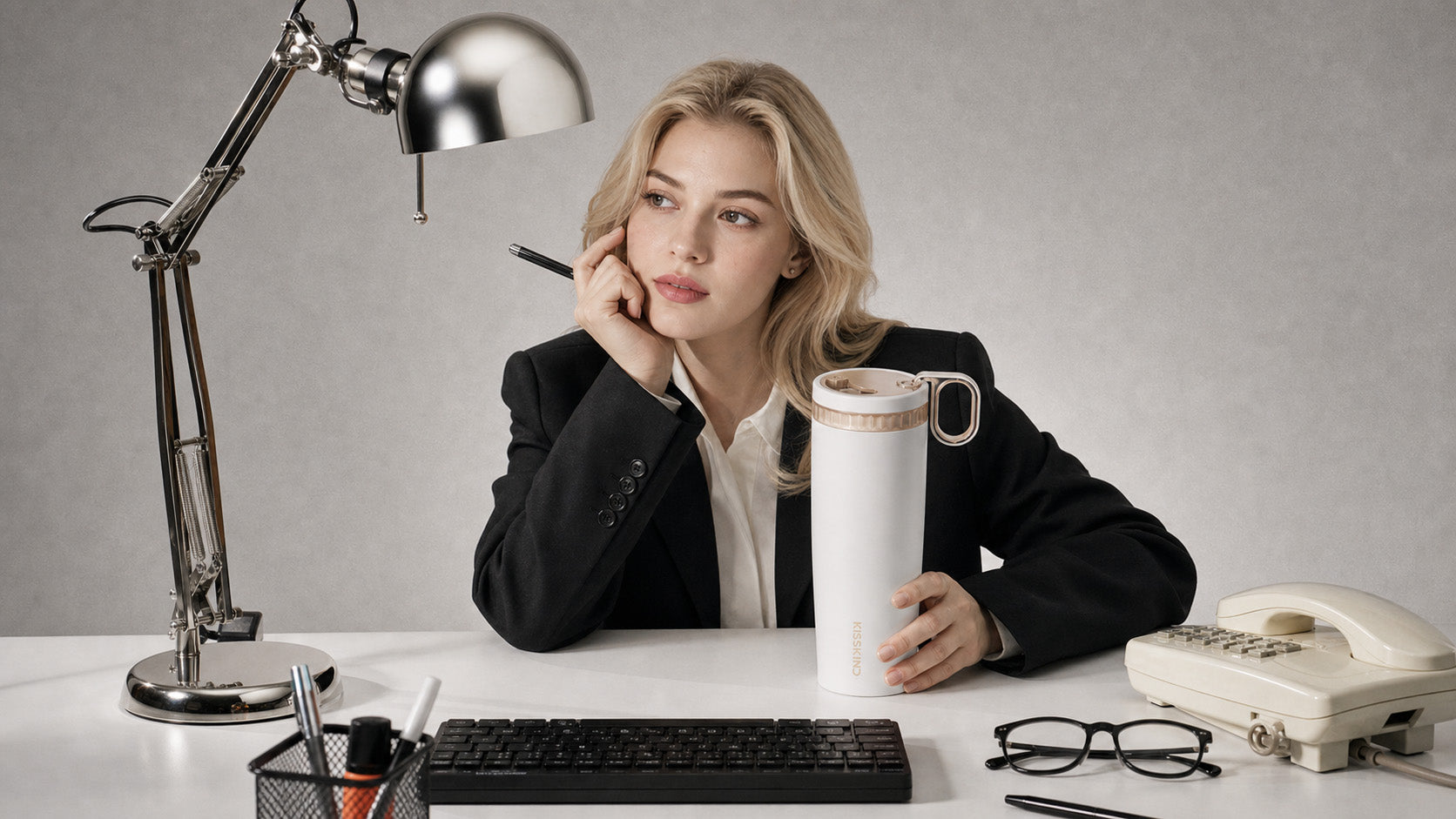 KissKind tumbler on a clean work desk after commute