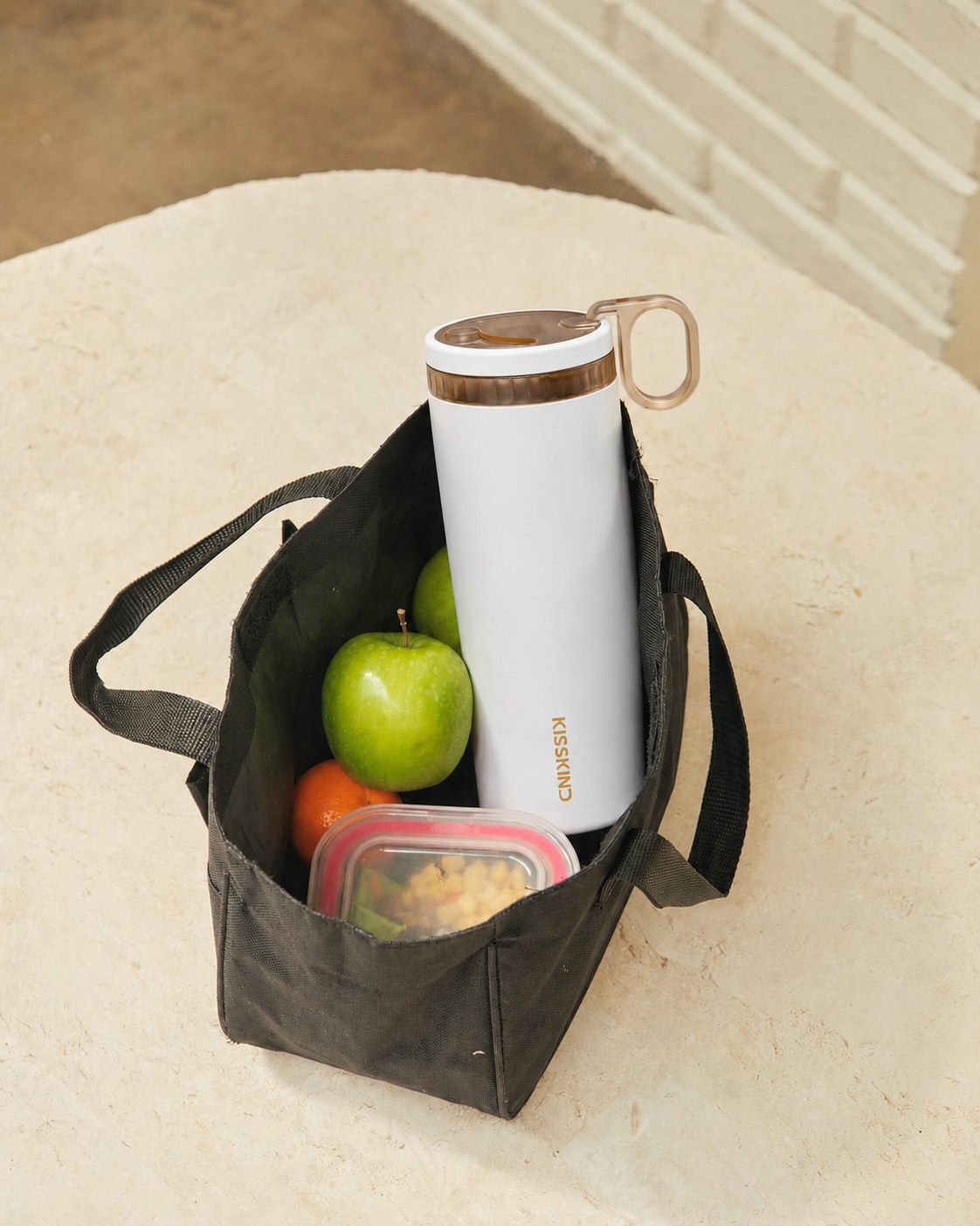 KissKind cup used with daily essentials