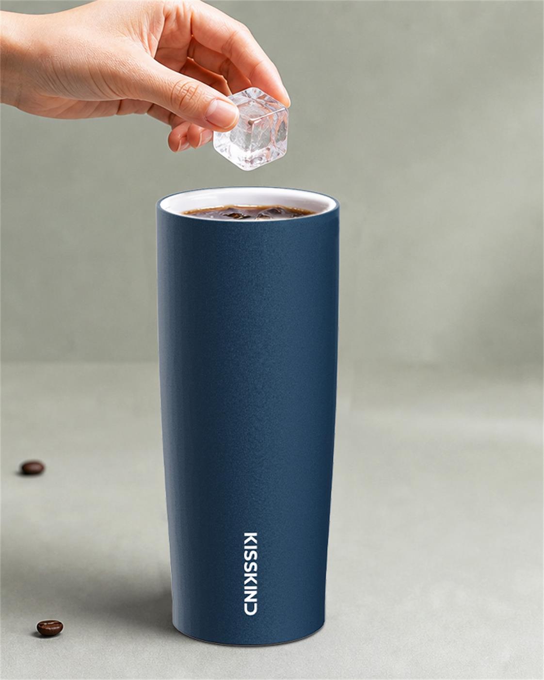 Blue KissKind cup in a tabletop drink scene