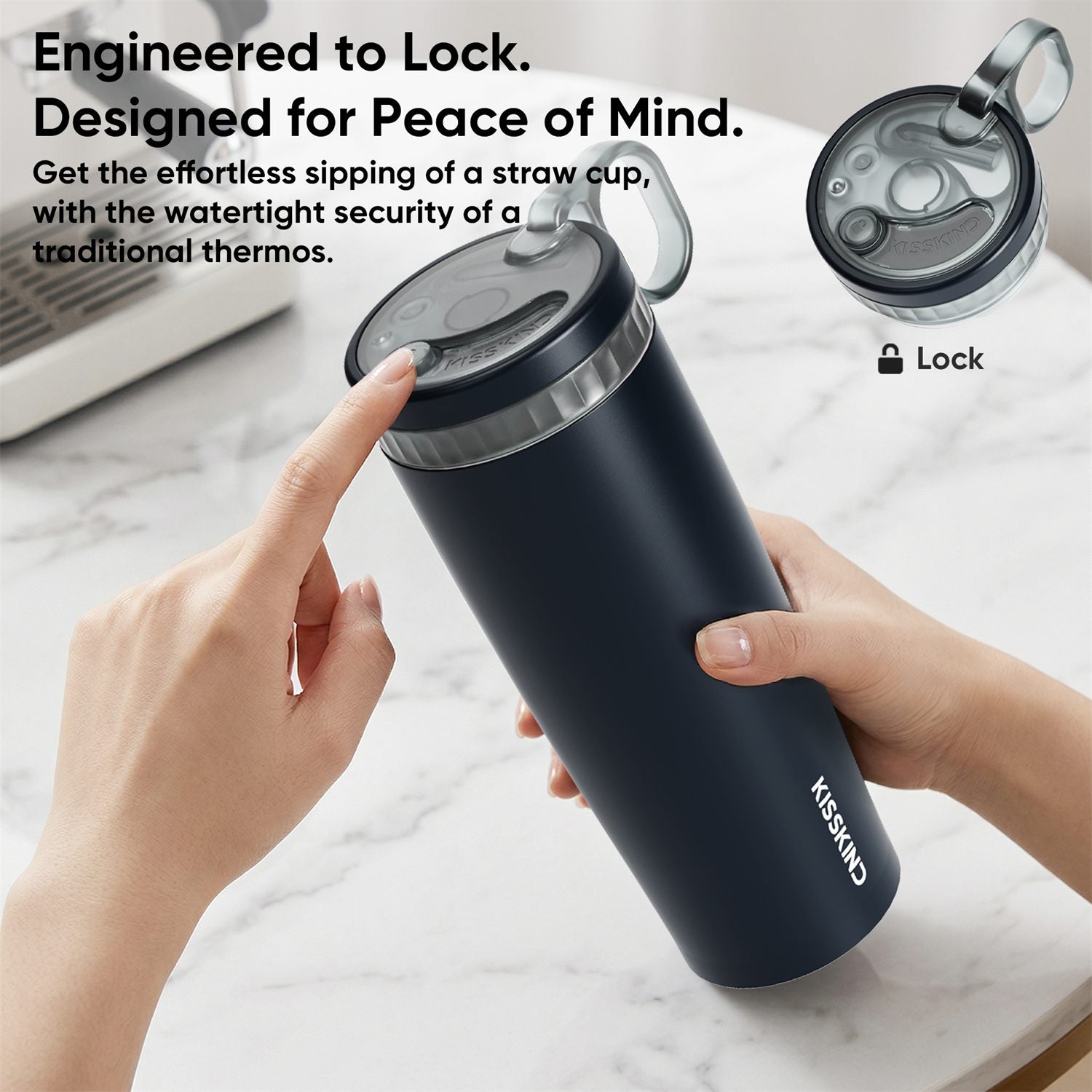 Hidden straw and locked lid on a black KissKind tumbler.