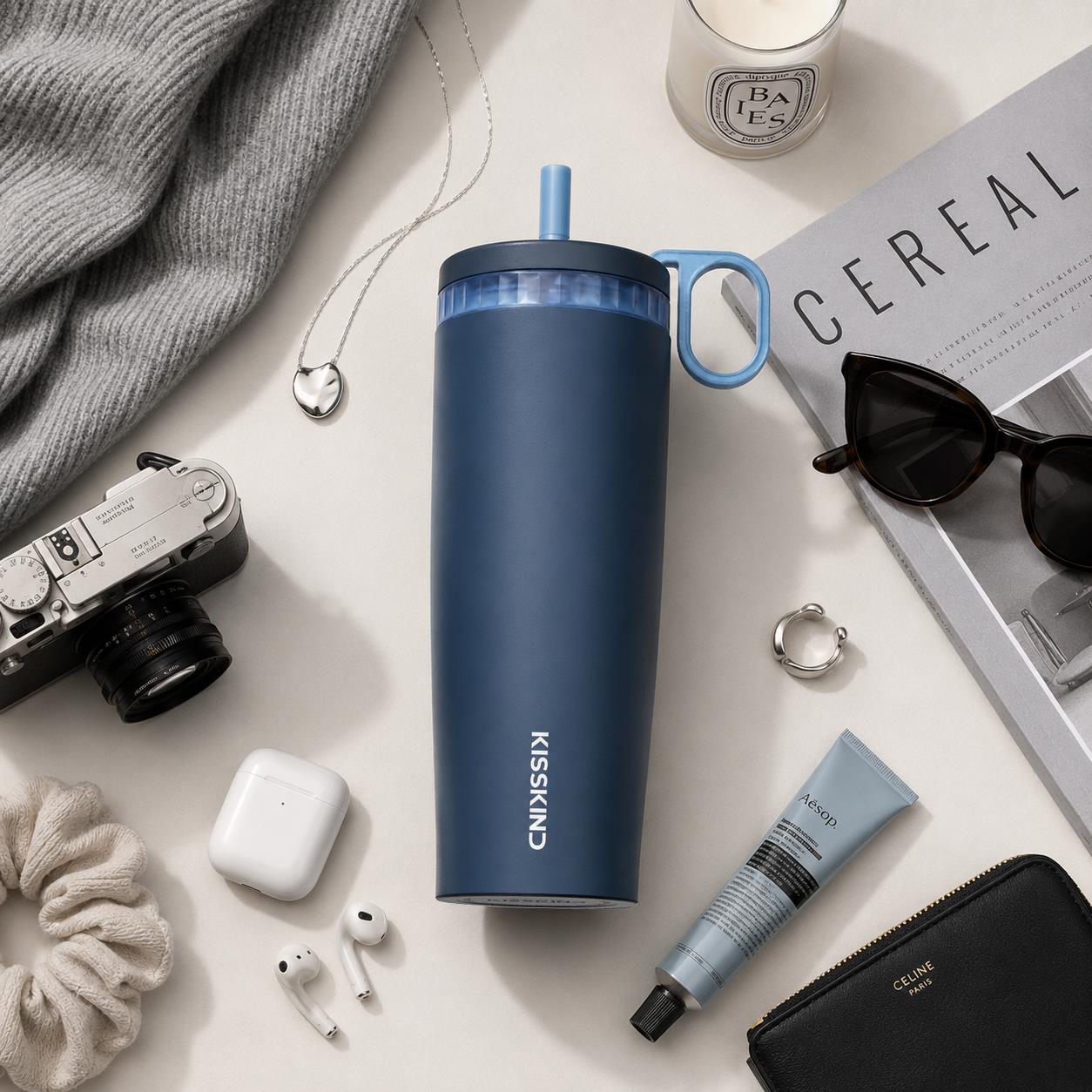 KissKind cup beside bag essentials that should stay protected